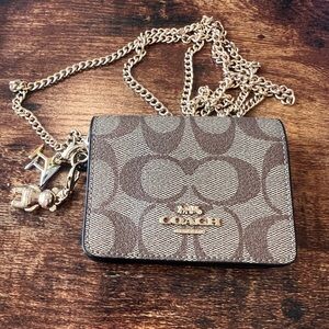 Coach Monogram Compact Wallet with 2 Goldtone Charms & Goldtone crossbody chain